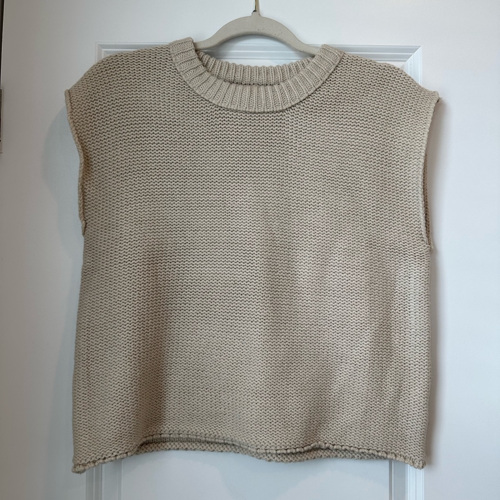 Cream sleeveless knit sweater vest